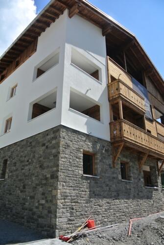 Fassadenbau Alpine Privà Alpine Lodge mit Art Stones